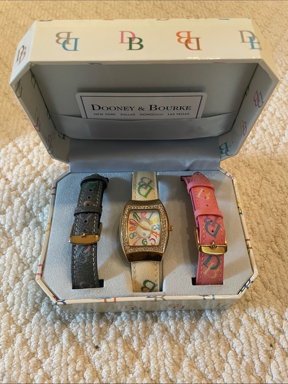 Dooney & Bourke Multicolor Logo Watch with Black, Cream, and Pink Straps